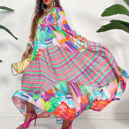 Šaty s véčkovým výstrihom a potlačou