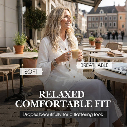 Ženska asimetrična bluza z zapenjanjem na gumb