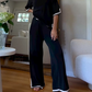 Top cu guler rotund și mânecă scurtă, pantaloni cu inserții, costum din două piese