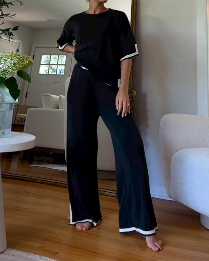 Top cu guler rotund și mânecă scurtă, pantaloni cu inserții, costum din două piese