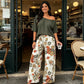 Set de 2 piese: Bluză cu umerii goi și pantaloni imprimați pentru femei