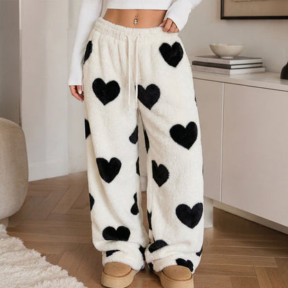 👖 Damen Plüschhose Herzprint weit